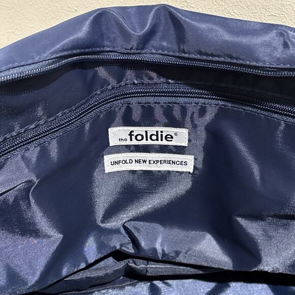 NEW WITH TAGS The Foldie Multipurpose Travel Bag - Navy Blue Lightweight Compact - Picture 9 of 12